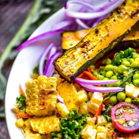 Zucchini corn salad in a bowl on the table.