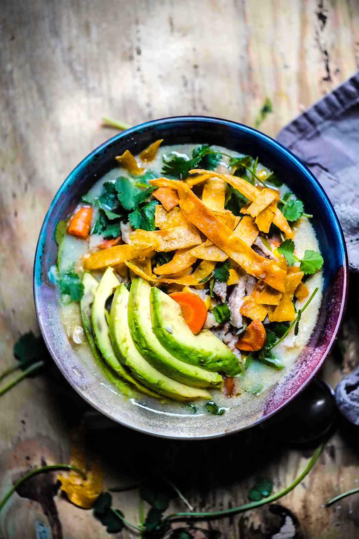 A bowl of gluten-free white chicken chili in the crock pot recipe.